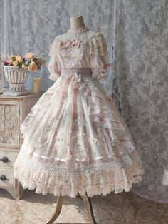 This price includes the OP, the embroidery waist belt, the chain bowknot on bodice, the lace bowknot on waist, the bowknot at back, two bowknots on hem, the overlay and the lace flat hat.  The sizes L, and XL will be shipped in 2 months. Dress / Top Details:Floral Embroidery / Floral Print / Ruffle TrimDress Waistline:Natural WaistSkirt Details:Tiered RufflesSleeves:Puff Sleeves  	 		 			Size 			S 			M 			L 			XL 		 		 			Bust 			87 			93 			99 			105 		 		 			Waist 			71 			77 			83 			89 Kawaii Academia, Gaun Abad Pertengahan, Op Dress, Lolita Outfits, Old Fashion Dresses, Pink Diamonds, Anne With An E, Dress Gloves, Fantasy Dress