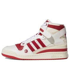 The Adidas Forum 84 High x Eric Emanuel "Indiana Hoosiers" are part of a collection inspired by college basketball. These stylish and comfortable high-tops have a two-tone color scheme, with an adjustable ankle strap for a secure fit. The serrated suede three-stripes, debossed Indiana branding, and double "E" logo give these shoes a varsity-inspired look that is perfect for fans of the Hoosiers. The durable rubber cupsole and red rubber outsole provide good traction and support, making these sho Double E Logo, Eric Emanuel, Adidas Forum, Indiana Hoosiers, College Basketball, Dream Shoes, Color Scheme, High Top, Indiana