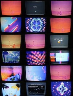 many televisions with different colored images on them