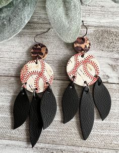 "How fun are these dangle baseball earrings? Please see ALL pictures before ordering, and read all the details. Thank you These earrings hang 3.5\" long! The two circle shapes are cork applied to leather. The dangle pieces are genuine leather. Gunmetal plated wire hooks Lead free" Cork Jewelry, Baseball Earrings, Diy Leather Earrings, Small Business Inspiration, Leather Pieces, Circle Shape, Leather Diy, Leather Earrings, Diy Earrings