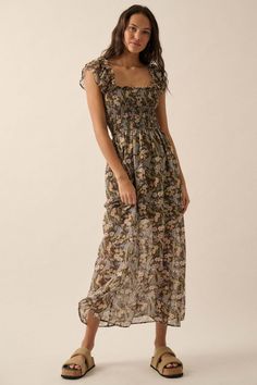 Floral-print chiffon maxi dress. Square neckline with ruffle. Smocked bodice. Short tiered ruffle sleeves. Low square back. Partial thigh-length lining. Ankle length. Fit-and-flare silhouette. 100% Polyester. Imported. Designed in LA. Model wears size S. Bohemian Maxi Dress With Smocked Bodice And Ruffled Straps, Casual Chiffon Maxi Dress With Smocked Back, Maxi Length Smocked Dress With Ruffles For Garden Party, Casual Tiered Chiffon Maxi Dress, Garden Party Smocked Maxi Dress With Ruffles, Garden Party Maxi Smocked Dress With Ruffles, Flowy Maxi Dress With Smocked Back And Square Neck, Casual Maxi Dress With Smocked Bodice And Ruffle Sleeve, Floral Print Chiffon Maxi Dress