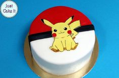 a pokemon themed cake with a pikachu on it