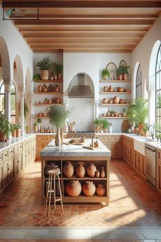 a kitchen filled with lots of pots and pans on the counter top next to an oven