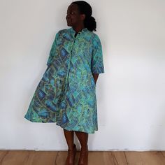 You will love our euphoria dress <3 Our loose fit colourful dresses made out of non-stretchy African print are perfect for you in case you are looking for a style idea that is versatile, comfortable, and looks fabulous year-round. All materials used to design the dresses are sourced in Kenya.  MEASUREMENT GUIDE:  We recommend asking questions about sizes or you can take your own measurements (at the bust) if unsafe. Since its an A- Line, you only need to ensure that you have the right fit for th Green Printed Dresses With Relaxed Fit, Green Printed Relaxed Fit Dress, Green Printed Dress With Relaxed Fit, Casual Cotton Dresses With Abstract Print, Green Cotton Shirt Dress For Vacation, Green A-line Casual Shirt Dress, Vacation Shirt Dress With Pockets, Midi Length, Casual Green A-line Shirt Dress, Midi Length Shirt Dress With Pockets For Vacation