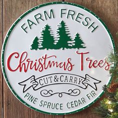 a sign that says farm fresh christmas trees cut and carry pine spruce cedar fir