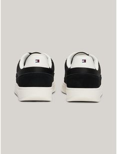 Tommy Hilfiger women's sneaker. Keep it casual—a combination of grained leather, smooth suede and webbing details brings an exciting mix of textures to these timeless sneakers.  Material: 70% Leather (fwa), 20% Polyamide, 10% Polyurethane. Timeless Sneakers, Th Logo, Tommy Hilfiger Women, Hush Puppies, Womens Sneakers, Tommy Hilfiger, Bring It On, Adidas, Texture