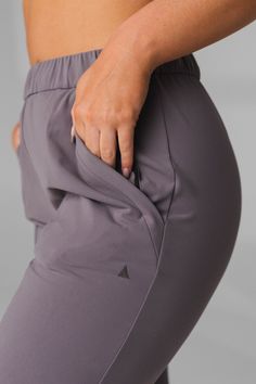 Our Nomad Jogger is designed to perform outdoors and on the go. This versatile high rise pant is a relaxed fit which offers functionality and comfort while also providing a sporty look to add to your wardrobe. Pants Woman, Cropped Joggers, Athletic Gear, Sports Wear, High Rise Pants, Athletic Apparel, Sporty Look, Sport Wear, Slim Legs