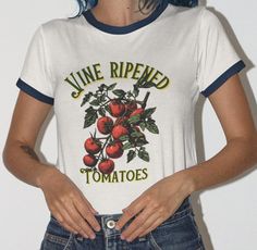 Step back in time with this vintage-style soft cotton ringer tee, showcasing a charming retro image of tomatoes accompanied by the words "Vine Ripened Tomatoes." This nostalgic design evokes the warmth and simplicity of days gone by, adding a touch of vintage flair to your wardrobe.  Crafted from ultra-soft cotton, this ringer tee offers both comfort and style with its classic contrasting collar and sleeves. Perfect for casual outings or relaxed weekends, embrace a timeless look that's as fresh Ringer Shirt, Nostalgic Design, Retro Images, Ringer Tee, Retro Shirts, Vintage Stil, Shirt Price, Style Vintage, Light Fabric