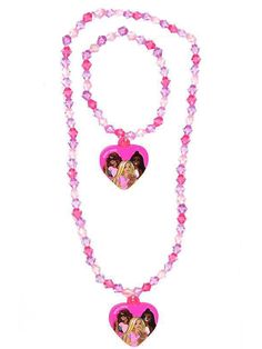 PRICES MAY VARY. SPARKLE AND SHINE: This set features a heart pendant necklace and matching bangle bracelet adorned with colorful gemstones for playtime glamour. FOR AGES 3+: Young fashionistas can mix and match the necklace and bracelet to create stylish looks while exploring imagination and self-expression. SAFE AND DURABLE: Made from lightweight and kid-safe materials, these accessories are designed to withstand enthusiastic play without breaking easily. EASY ON AND OFF: The necklace has an a Barbie Necklace, Pink Jewelry Set, Heart Jewelry Set, Colorful Gemstones, Plastic Jewelry, Jewelry Images, Necklace And Bracelet, Small Heart, Girls Jewelry