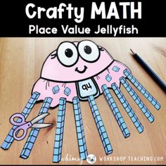 the crafty math place value jellyfish with scissors and pencils on a table