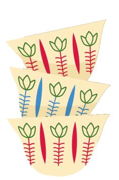 three paper boats with leaves on them are stacked in the shape of an oar