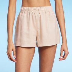 Stay comfortable and stylish all summer long in these High-Waist Cover-Up Shorts from Shade & Shore™. Made from breathable linen gauze fabric, these unlined cover-up shorts provide maximum coverage and help you stay comfy during beach vacays or trips to the pool. Designed in a just-above-waist length, they can be worn over any of your favorite one- or two-piece swimsuits. Relaxed Bottoms With Built-in Shorts For Summer, Linen Bottoms With Built-in Shorts For Vacation, Relaxed Spring Bottoms With Built-in Shorts, Lightweight Summer Bottoms For Vacation, Lightweight Summer Shorts For Vacation, Lightweight Summer-ready Shorts For Vacation, Lightweight Summer Beachwear Bottoms, Lightweight Beachwear Bottoms For Summer, Lightweight Bottoms For Spring Vacation