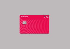 a pink credit card on a gray background with the word, sharecard 2012 written below it