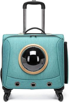 a piece of luggage with wheels and a cat's eye on the front side