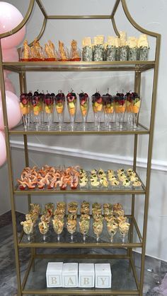 a display case filled with lots of different types of desserts on it's sides