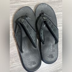 Great Condition, Never Worn. Size 10 Black Flip Flops For Outdoor Use, Black Flip Flops With Arch Support For Outdoor, Black Cushioned Flip Flops For Outdoor, Outdoor Black Cushioned Flip Flops, Black Synthetic Flip Flops For Outdoor, The North Face Shoes, North Face Shoes, Swim Shoes, Adidas Track