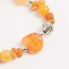 Buy the John Bead Crystal Orange-Dyed Citrine Natural Stone Bracelet at Michaels. com. Crystals are sometimes believed to have health benefits and these stones in particular are associated with energy, clear thinking, psychic ability, spiritual development and immune system performance. This cute accessory features orange-dyed citrine, natural stone beads and silver-tone spacer beads. Crystals are sometimes believed to have health benefits and these stones in particular are associated with energ Orange Gemstone Beaded Bracelets For Meditation, Amber Beaded Bracelets For Healing, Orange Spiritual Gemstone Bracelets, Spiritual Orange Gemstone Bracelets, Amber Gemstone Bracelet For Healing, Amber Bracelets With Natural Stones For Meditation, Psychic Ability, Clear Thinking, Natural Stone Beads