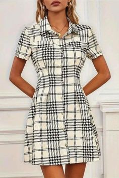 This women’s mini dress features short sleeves and a classic plaid pattern with a stylish lapel collar. Perfect for casual wear or day outings, its chic design offers a blend of comfort and sophistication. A versatile addition to any wardrobe, ideal for a polished yet relaxed look. Fitted Short Sleeve Midi Dress With Placket, Fitted Midi Dress With Placket And Short Sleeves, Casual Plaid A-line Dress, Casual A-line Shirt Dress For Dress Down Occasions, Short Sleeve Mini Dress With Buttons For Fall, Casual Plaid Midi Dress For Work, Casual A-line Plaid Dress, Fall Mini Dress With Buttons And Short Sleeves, Plaid Mini Dresses With Button Closure