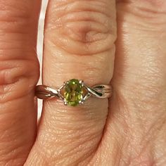 Here Is A Great Ring With A Peridot Colored Cz In Sterling Silver. This Ring Is Brand New, Never Been Worn. This Beauty Is A Size 7 And Would Look Great With Any Outfit You Would Pair It With! Sterling Silver Cz Rings, Peridot Color, Cz Ring, Womens Jewelry Rings, Looks Great, Women Jewelry, Sterling Silver, Green, Silver