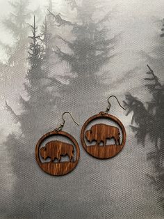 Beautiful, lightweight, brown toned, laser cut wooden earrings. Pair perfectly with any outfit, dressy or casual! Super lightweight and comfortable. Measures 2 x 2”. Brown Wooden Drop Earrings, Brown Wood Drop Earrings, Brown Wooden Earrings For Pierced Ears, Casual Brown Wooden Jewelry, Wholesale Merchandise, Wooden Earrings, Laser Cut