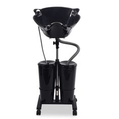 a black coffee maker with two cups on it's legs and the handle is attached to