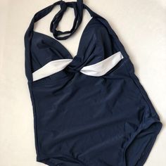 One Piece Swimsuit Size M/M Never Worn.New Without Tags Navy Beachwear Bodysuit For Pool, Navy One-piece Beachwear Bodysuit, Navy One-piece Bodysuit For Beachwear, Navy Sleeveless Lined Swimwear, Navy Stretch Bodysuit For Beach, Navy Stretch Bodysuit For The Beach, Navy Beachwear Bodysuit For Summer, Navy Summer Beach Bodysuit, Navy Summer Bodysuit For Beach