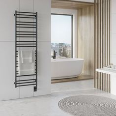 a bath room with a tub and a towel rack