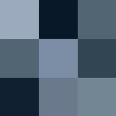 an abstract black and white checkered background with squares in different shades, including blue