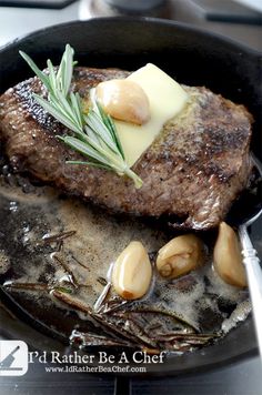 steak with potatoes and butter in a skillet on the stove top, ready to be cooked