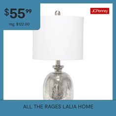 a table lamp with a price tag for $ 55 99 reg $ 122 00 all the rages laia home