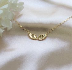 Embrace your inner angel with this delicate and ethereal angel wing necklace. A symbol of protection and guidance, perfect for any occasion. Wear this as a reminder that you have an angel watching over you. Perfect for yourself as well as gifting to someone special.IT'S IN THE DETAILS✦ 14K gold filled or sterling silver necklace chain✦ Gold plated Brass or Sterling Silver Angel Wings 20 x 8mm with tarnish resistant coating✦ Offered in 2 different styles and multiple lengths for a custom fit ✧ Ne Ethereal Angel, Angel Wings Necklace, Guardian Angel Necklace, Angel Wings Jewelry, Symbol Of Protection, Silver Angel Wings, Angel Wing Necklace, Angel Necklace, Jewelry Tattoo