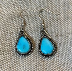 These one of a kind, handmade natural turquoise earrings are set in Sterling Silver. Turquoise Southwestern Earrings With Natural Stones, Southwestern Turquoise Teardrop Earrings For Gift, Southwestern Turquoise Earrings With Natural Stones, Artisan Turquoise Nickel-free Earrings, Artisan Nickel-free Turquoise Earrings, Artisan Turquoise Drop Earrings Jewelry, Handmade Turquoise Teardrop Earrings Southwestern Style, Artisan Turquoise Jewelry With Matching Earrings, Turquoise Teardrop Earrings For Jewelry Making