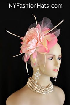 Women’s Pink Sinamay Straw Large Flower Feather Bow Fashion Designer Haute Couture Hat Headpiece Wedding Fascinator Hair Accessory. A Large Pastel Pink Horsehair Crinoline Bow Is Placed On A Simulated Pink Sinamay Straw Round Base, Accented With A Large Vintage Ivory Yellow And Pink Handmade Silk Flower, Embellished With White Goose Biot Feathers. This Formal Art Deco Styled 1920’s Style Flapper Hat Wedding Headpiece Can Be Worn In Different Positions. This ladies bespoke couture formal designer wedding fascinator hat is appropriate to wear for horse races, The Kentucky Derby, The Dubai World Cup, The Royal Ascot, The Melbourne Cup, Belmont Stakes, The Preakness Stakes horse racing, Church, weddings, and special occasion. This lovely Spring and Summer fascinator is also suited for mother o Kentucky Derby Wedding, Special Occasion Hats, Mother Of The Bride Hats, Derby Wedding, Derby Ideas, Custom Made Hats, Preakness Stakes, Bow Fashion, Bridal Fascinator