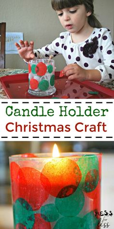 the candle holder is made out of plastic and has christmas decorations on it, as well as a small child's hand