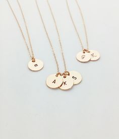 A sweet necklace for moms and grandmas! The necklace features dainty 9mm disk pendants with the initials of your choosing. Each disk comes in 14kt Gold filled, Sterling Silver, or rose gold filled (waterproof!). The disks will match the chain you choose. The circles are hand-stamped by me in my little studio, I make these with lots of love and care!  Wish there was an additional charm added? A symbol? Something else? We love to customize - just send us a message! Details *Circle: 9mm.,14kt Gold Initial Round Pendant Necklace For Mother's Day Anniversary, Initial Round Pendant Necklace For Anniversary And Mother's Day, Dainty Initial Necklaces As A Gift For Mom, Dainty Initials Necklace Gift For Mom, Initial Round Pendant Necklace For Anniversary On Mother's Day, Dainty Initials Necklace As Gift For Mom, Dainty Initials Necklace For Mom, Hand Stamped Round Disc Necklace For Mom, Hand Stamped Round Pendant Necklace For Mom