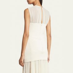 Proenza Schouler "Niki" dress consists of a rib-knit bodice and an accordion-pleated skirt  Round neckline Sleeveless Full length Back button/loop closure Center back zip Polyester Dry clean Imported Evening Sleeveless Ribbed Midi Dress, Elegant Stretch Ribbed Sleeveless Dress, Sleeveless Ribbed Midi Dress For Evening, White Sleeveless Dress With Accordion Pleats, Elegant Fitted Sleeveless Ribbed Dress, Elegant Ribbed Sleeveless Dress, Fitted Sleeveless Pleated Evening Dress, Fitted Sleeveless Pleated Dress, Fitted Sleeveless Dress With Accordion Pleats