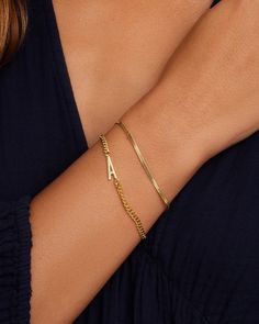 Achieve a timeless look with the Venice Mini Bracelet. This gorgeous gold-plated bracelet features a classic herringbone chain design that is perfect for any occasion. To wear, stack alongside other gold or beaded bracelets. More is more! Venice Mini Bracelet in Gold, Women's by gorjana Classic Gold Name Bracelet Hypoallergenic, Classic Gold Hypoallergenic Name Bracelet, Classic Adjustable Snake Chain Bracelets, Classic Snake Chain Bracelets For Gift, Classic Gold Plated Name Bracelet, Classic Snake Chain Bracelet, Perfect As A Gift, Classic Snake Chain Bracelet For Gift, Classic Snake Chain Bracelet Gift, Dainty Gold Snake Chain Bracelet