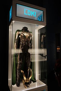 a display case with a costume on it