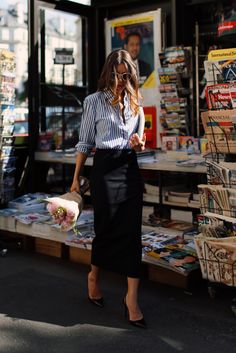 One way to style a casual spring outfit is with a vertically striped shirt. Via Sarah NaitShirt: Tommy Hilifiger Skirt Diy, Walking Down The Street, Pencil Skirt Outfits, Style Rules, Bohol, French Girls, Pencil Skirts, Business Outfit, A Skirt