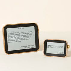 two kindle devices sitting next to each other on a white surface with the same text