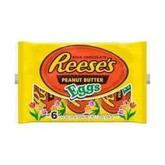 reese's peanut butter eggs are on display in a yellow package with flowers and leaves