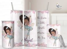 three personalized travel mugs with the names of two different fairy princesses on them