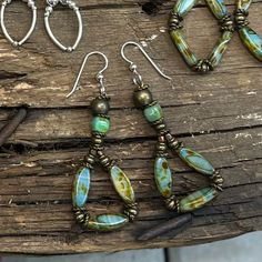 These Earrings Have Such Pretty Earthy Colors And A Boho Vibe! They’re Lightweight And Have Great Movement. They’re Made With Antiqued Brass And Aqua, Blue, Green And Brown Beads Then Finished Off With .925 Sterling Silver Ear Wires. They’ve Been Sealed And Polished With Renaissance Jewelry Wax To Keep Them Looking Beautiful For A Long Time! *No Two Pieces Will Ever Be Completely Identical As Each Piece Is Made By Hand. Handmade Items Have Natural Imperfections As They Are Not Mass Made. Please