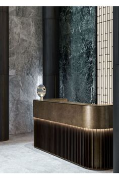 an elegant bathroom with marble walls and flooring