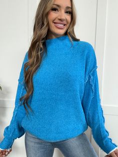 Snuggle up in cozy style with our Cuddle Season Mock Neck Long Sleeve Sweater! The sky blue color and exposed seam add an unexpected touch to this soft, stretchy sweater. Perfect for staying warm and stylish this fall. DETAILS Sky blue sweater Long sleeve Mock neck neckline Exposed seam Soft, stretchy material Perfect for the fall season SIZING Fits true to size Chelsea is wearing a size small MEASUREMENTS S/M:Bust 34-38 in, Waist 26-31 in L/XL:Bust 39-42 in, Waist 32-35 in MATERIALS AND CARE 79 Soft Textured Blue Sweater For Winter, Trendy Light Blue Winter Sweatshirt, Cozy Blue Long Sleeve Sweater, Cozy Light Blue Long Sleeve Sweater, Blue Soft Knit Turtleneck Sweater, Light Blue Soft Knit Fall Sweater, Light Blue Soft Knit Sweater For Fall, Blue Knit Long Sleeve Sweatshirt, Cozy Blue Sweater For Fall