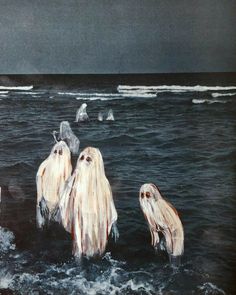 three ghost like creatures swimming in the ocean