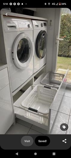 a washing machine and dryer in a room