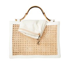 The Reece handbag is the perfect summer stand-out piece! Features distinctive design elements using a unique combination of wicker, lambskin leather, and bamboo handles. Includes a removable inner cotton lining with zipper closure. Product Overview: Materials: Wicker, bamboo, lambskin leather and cotton Size: 10” x 11” White Bags With Bamboo Handle For Everyday Use, White Shoulder Bag With Bamboo Handle For Daily Use, Elegant White Straw Bag With Bamboo Handle, Chic Straw Bag With Bamboo Handle, White Tote Bag With Bamboo Handle, White Tote Shoulder Bag With Bamboo Handle, White Top Handle Bag With Bamboo Details, Luxury Summer Straw Bag With Round Handle, Luxury Summer Shoulder Bag With Bamboo Handle