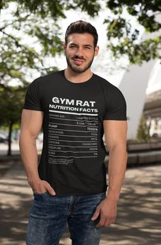 Get ready to share some laughs and gym wisdom with our 'Gym Rat Nutritional Facts' t-shirt! This hilarious design is packed with tongue-in-cheek 'nutritional facts' that every dedicated gym rat can relate to, making it a must-have addition to your workout wardrobe. Crafted from premium materials, this shirt offers both comfort and durability, ensuring that it can keep up with even your toughest workouts. The bold graphic and witty 'nutritional facts' serve as a conversation starter, sparking lau Funny Text Short Sleeve T-shirt For Gym, Sporty T-shirt With Funny Text For Sports, Funny Black Sports T-shirt, Black Gym Tops With Funny Text, Black Gym Top With Funny Text, Short Sleeve Gym T-shirt With Funny Text, Gym Slogan T-shirt With Crew Neck, Cotton Slogan T-shirt For Gym, Funny Short Sleeve Sports T-shirt