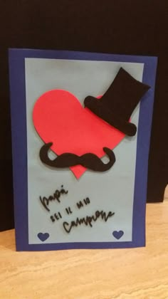 a card with a mustache, top hat and heart on the front that says happy 1st anniversary